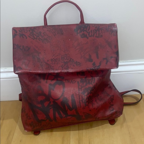 RARE RED AND BLACK DKNY REAL LEATHER GRAFFITI BACKPACK/ PURSE
